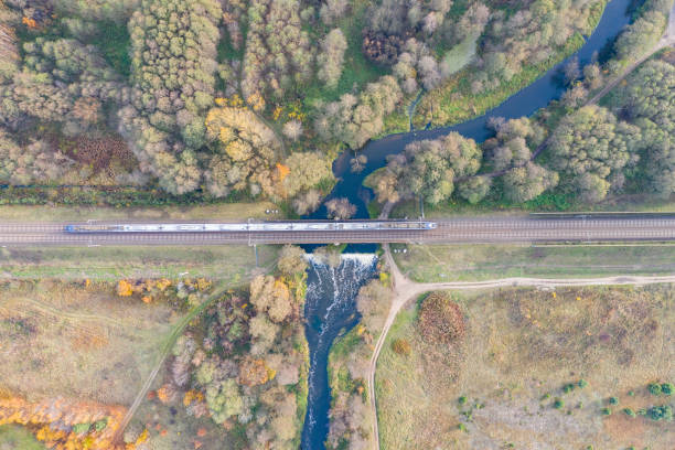istock the train passes over the bridge over the river 1078317444