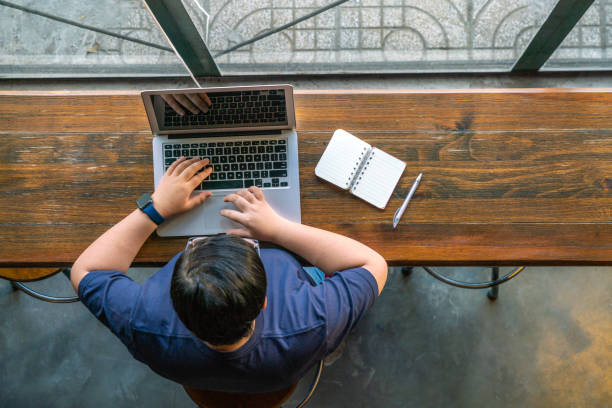 istock Short-hair woman working on laptop 1078322446
