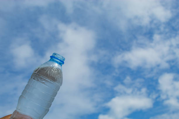 istock Drink water and bright blue sky. 1078327174