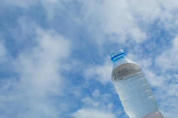 istock Drink water and bright blue sky. 1078327198