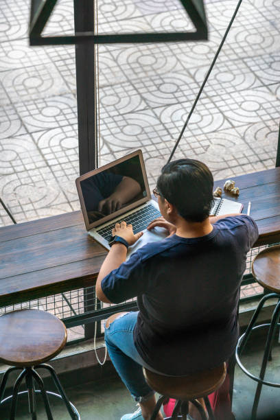 istock Short-hair freelancer working hard on laptop 1078330384