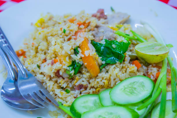 istock Fried rice with pork Put eggs and leafy green vegetables are most people eat. 1078344968