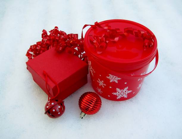 istock Christmas gift box and container on snow background 1078348060