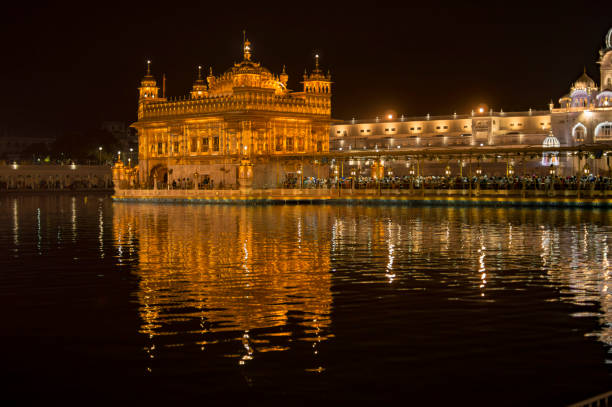 istock Golden temple illuminated with electric lights turned on for night view 1078348430