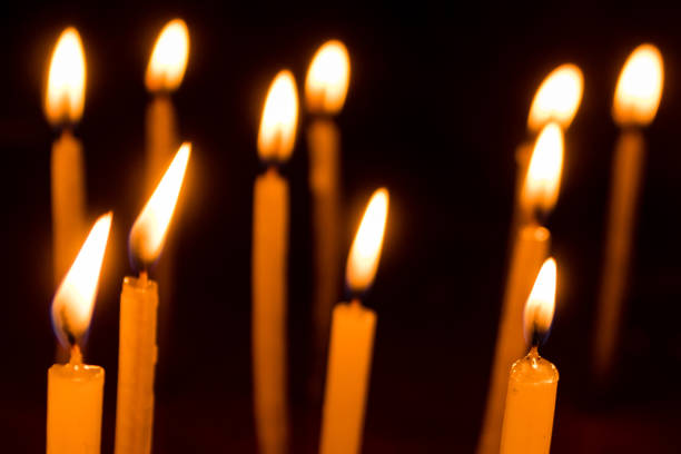 istock Candle flame set isolated in black background. 1078356010