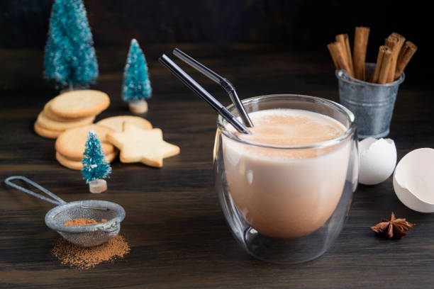 istock Christmas cocktail eggnog on a light background, in a glass mug. 1078361992