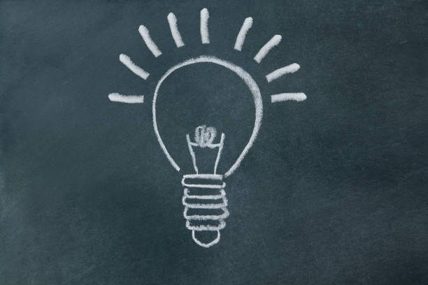 istock Illustration of a light bulb written on a blackboard 1078371096