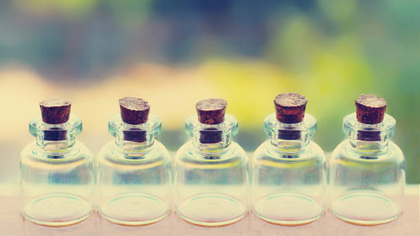 istock A set of small glass jars, toned 1078371154