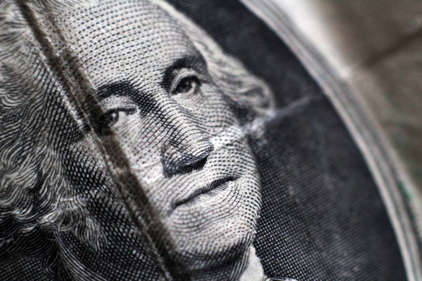 istock One us dollar is very close. Cash. 1078373864