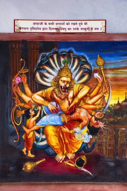 Narasimha VishnuÕs Avatar as semi-man, semi-lion kills the demon Hiranyakashipu with his sharp fingernails. ISKCON temple, Pune, Maharashtra