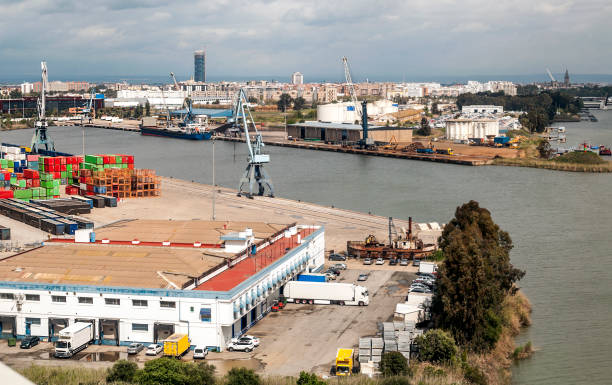 Port of Seville Port of Seville on the Guadalquivir river in Spain seville port stock pictures, royalty-free photos & images