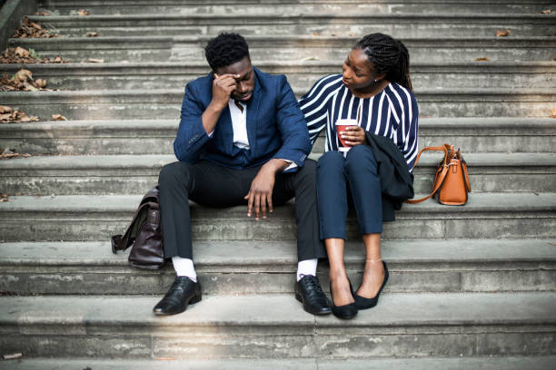 istock Woman consoling her colleague 1078384520