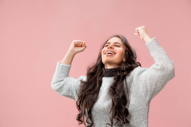 istock Winning success woman happy ecstatic celebrating being a winner. Dynamic energetic image of female model 1078390132
