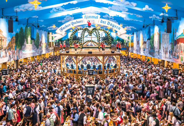 beertent hacker-pschorr - oktoberfest 2018 - munich - bavaria Munich, Germany - October 1: famous beer tent called Hacker-Pschorr and people at the biggest folk festival in the world - the oktoberfest on oktober 1, 2018 in munich. munich stock pictures, royalty-free photos & images