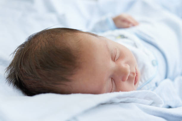 istock baby girl sleeping 1078390728