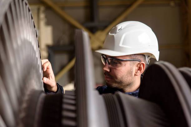 Man at work Man at work gas turbine stock pictures, royalty-free photos & images