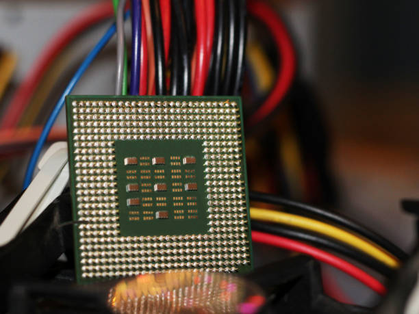 istock Close up of CPU Processor over Computer Motherboard. Tecnology background. 1078390970