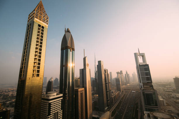 istock Dubai, UAE - October, 2018. Dubai skyline and downtown skyscrapers on sunset. Modern architecture concept with highrise buildings on world famous metropolis in United Arab Emirates 1078402724