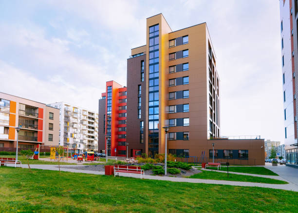 istock New apartment house and home building complex concept playground 1078414532