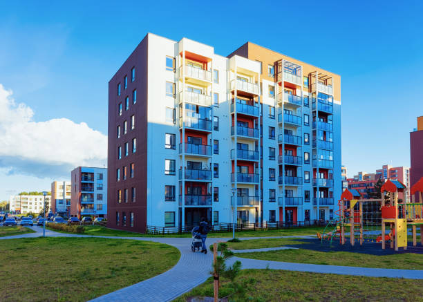 istock Apartment house and home building complex concept playground 1078414790