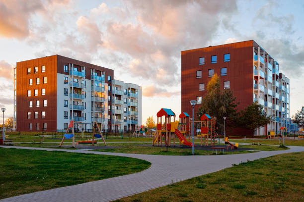 istock New apartment house home buildings complex concept playground 1078417412