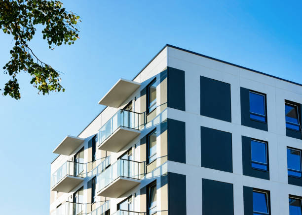 istock Facade modern apartment house copy space green tree 1078417720