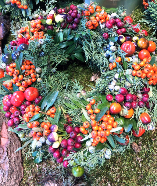 istock Christmas wreath on background of branches with copy space 1078418350