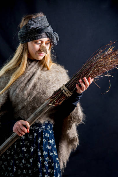 istock A young woman wearing a witch costume 1078420690