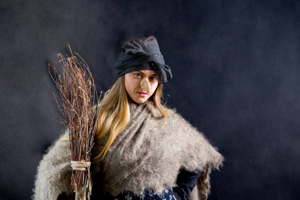 istock A young woman wearing a witch costume 1078420706