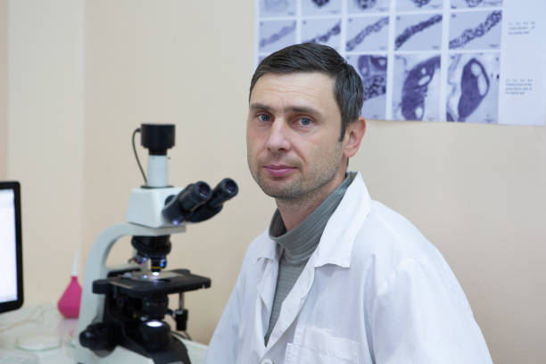istock scientist working at the laboratory. Screen image of molecule made by myself 1078422220