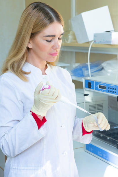 istock Young scientist works in modern biological lab 1078423476