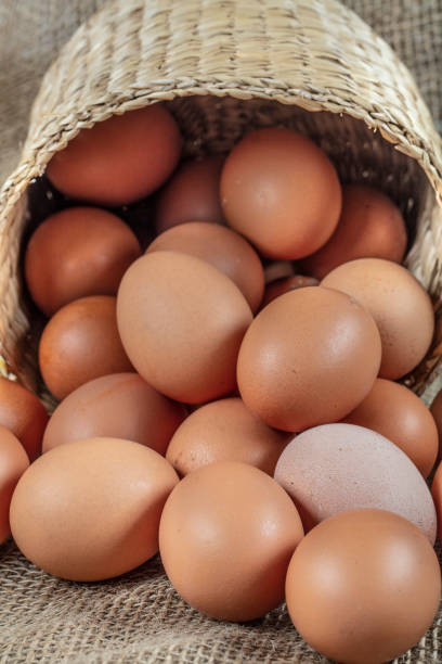 istock chicken eggs in burlap sack on an wooden background 1078424422