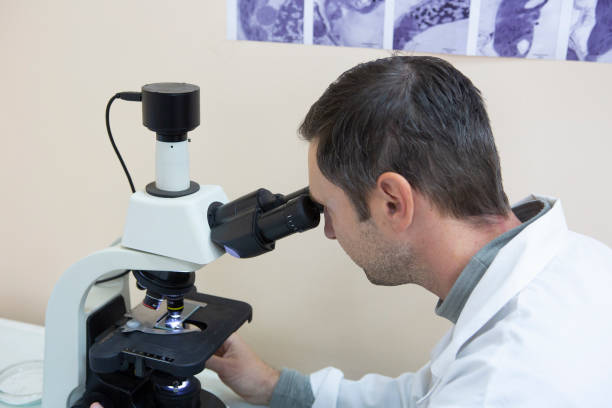 istock scientist working at the laboratory. Screen image of molecule made by myself 1078424958