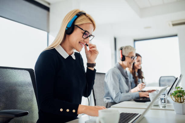 happy woman at call center - bluetooth headset women customer imagens e fotografias de stock