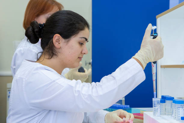 istock Young scientist works in modern biological lab 1078425576