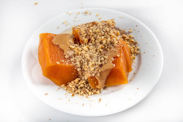 Traditional Turkish pumpkin dessert called kabak tatlisi. Traditional Turkish pumpkin dessert called kabak tatlisi. squash vegetable stock pictures, royalty-free photos & images