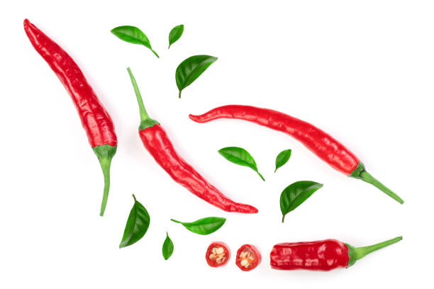 istock sliced red hot chili pepper isolated on white background. Top view. Flat lay pattern 1078431434