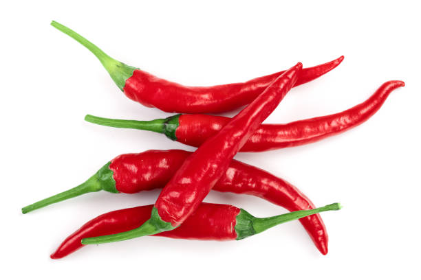 istock red hot chili peppers isolated on white background. Top view. Flat lay pattern 1078431442