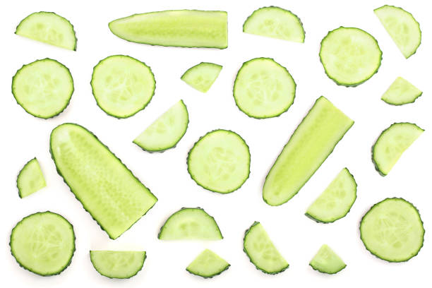 istock Cucumber slices isolated on white background. Top view. Flat lay pattern 1078437906