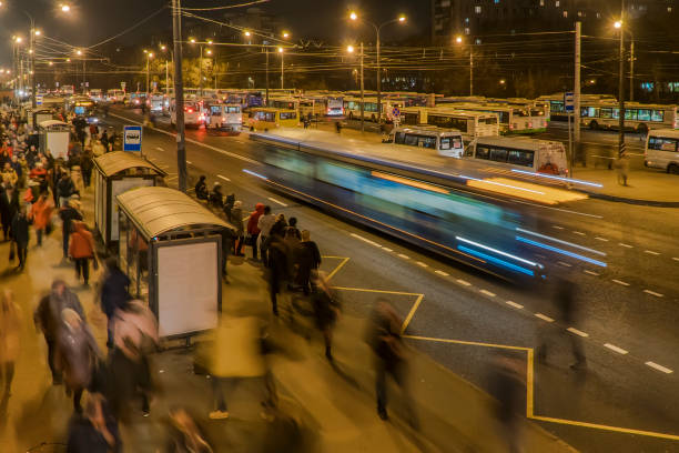istock passengers waiting and boarding buses at the bus terminal 1078444372