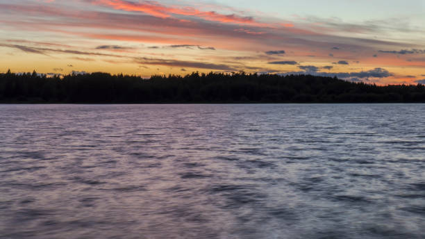 istock sunset view of the forest lake 1078447068