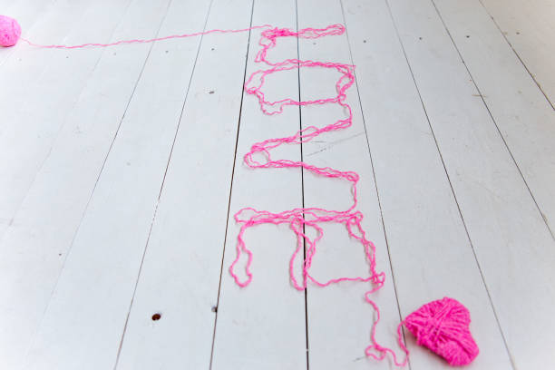 Abstract network made from colorful cotton yarn on white background