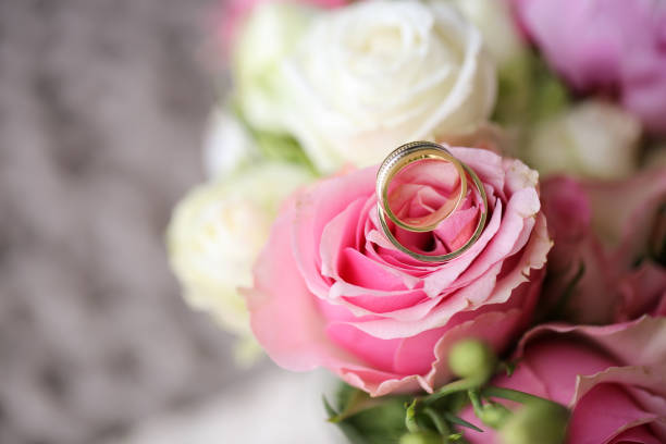 istock Close up with beautiful flowers and rings 1078448460