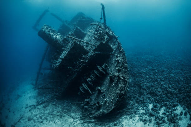 istock Huge rusty shipwreck completely overgrown by corals and algae lying at the bottom of the Red Sea 1078448994