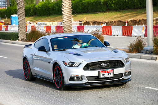 Dubai, UAE - November 16, 2018: Muscle car Ford Mustang in the city street.