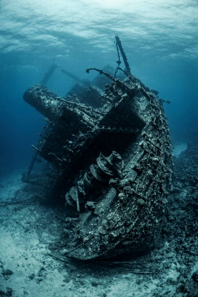 istock Huge rusty shipwreck completely overgrown by corals and algae lying at the bottom of the Red Sea 1078451870