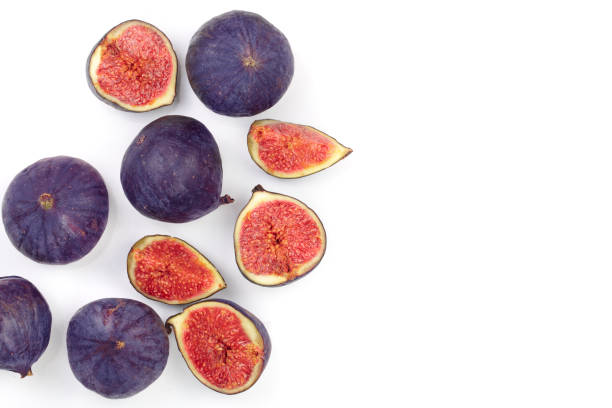 istock fig fruits isolated on white background with copy space for your text. Top view. Flat lay pattern 1078452164