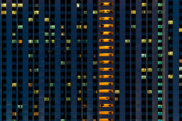 istock Illuminated windows of hotel 1078452550