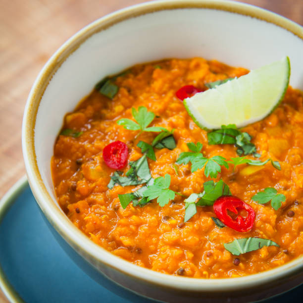 istock Red Lentil, Coconut and  Lime Dal Dhal Daal Curry  -  Plant Based oriental recipe. 1078453016