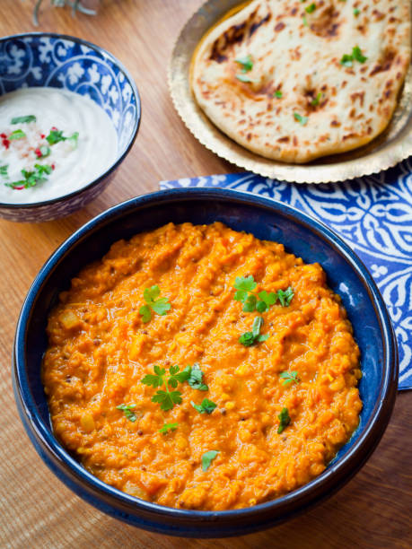 istock Red Lentil, Coconut and  Lime Dal Dhal Daal Curry  -  Plant Based oriental recipe. 1078454074